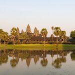 Angkor Wat seen across the moat under a wide sky, Siem Reap, Cambodia