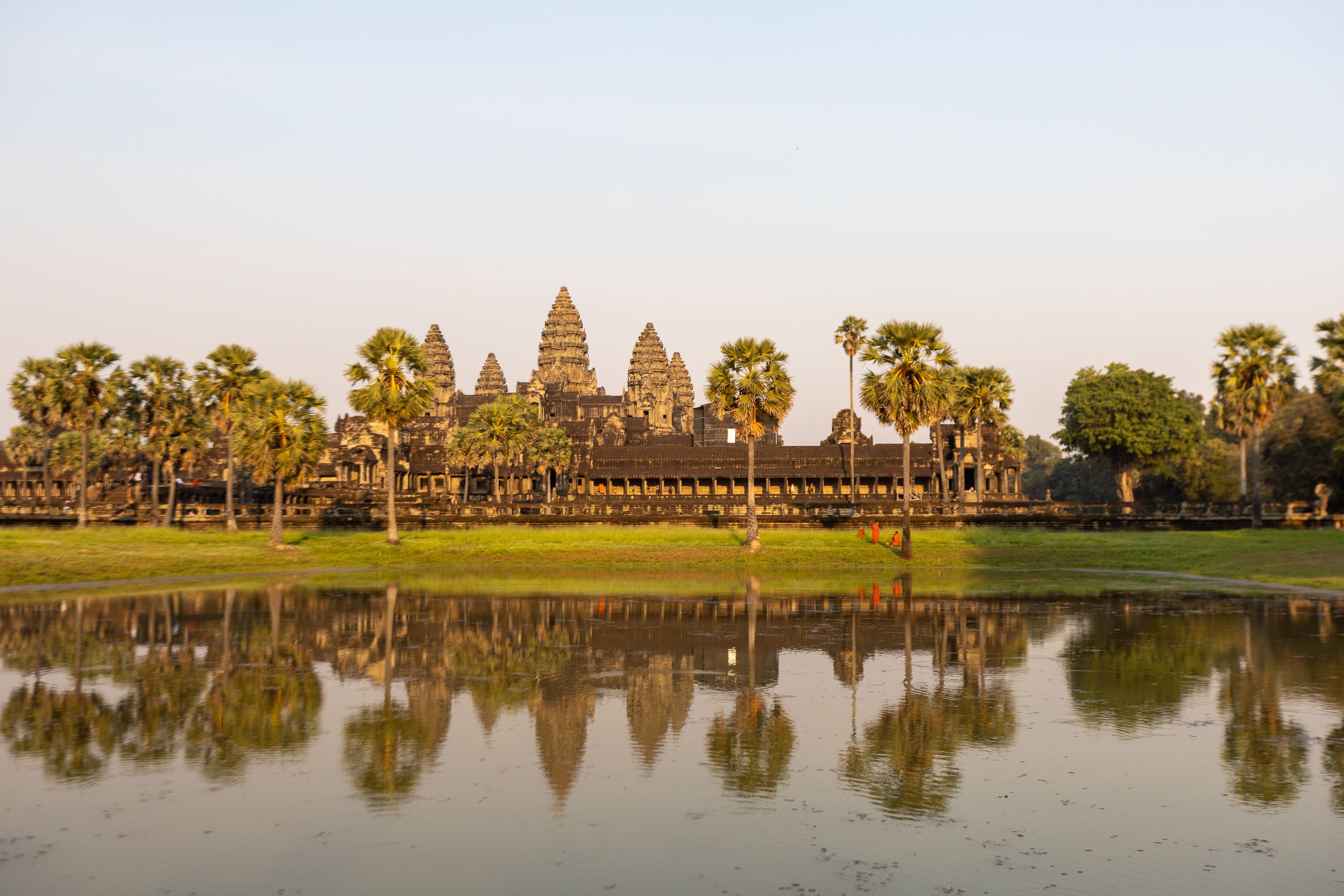Angkor Wat seen across the moat under a wide sky, Siem Reap, Cambodia