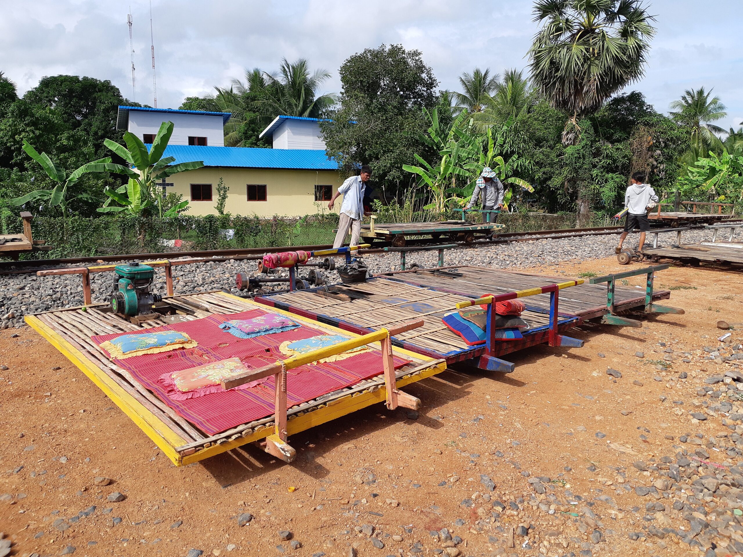 Bamboo train platforms with cushions waiting at the station, Battambang, Cambodia