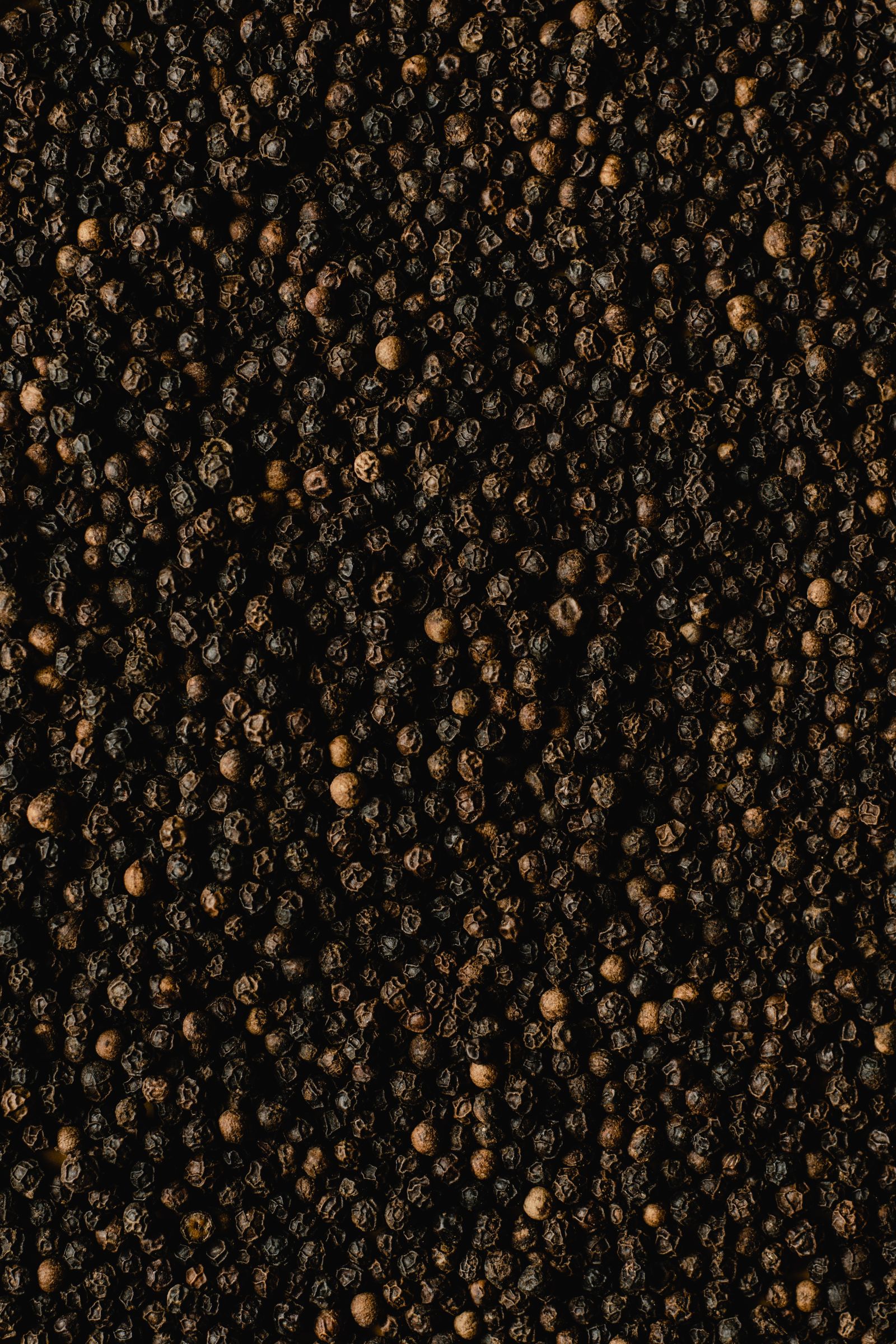 Black peppercorns after drying
