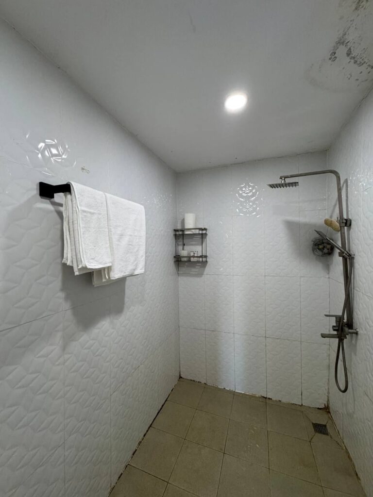 Bathroom in the Frangipani Container House, Sea River Lodge