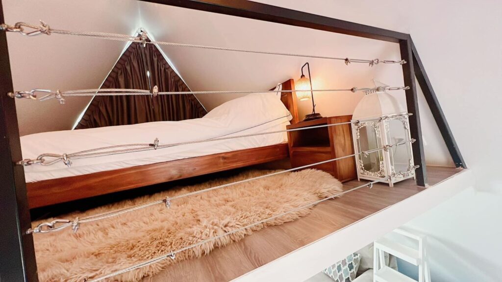 Bedroom in the Lotus A-Frame House, Sea River Lodge
