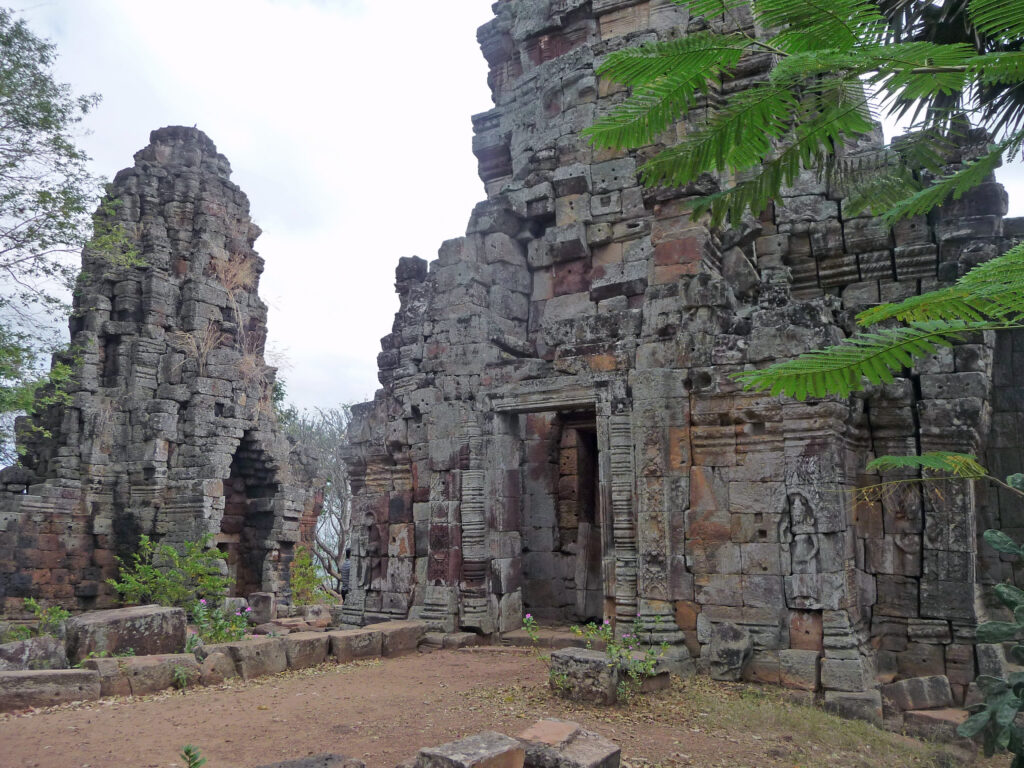 Weathered towers and doorways at the Phnom Banan temple, Battambang, Cambodia
