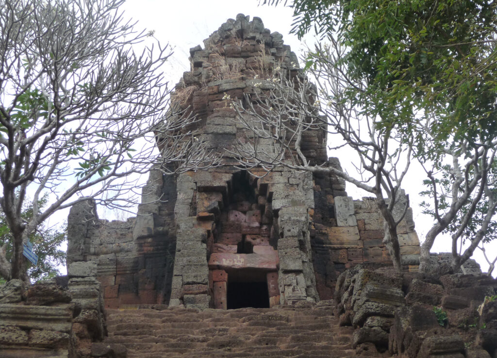 A laterite and sandstone tower at Phnom Banan with a carved lintel, Battambang, Cambodia